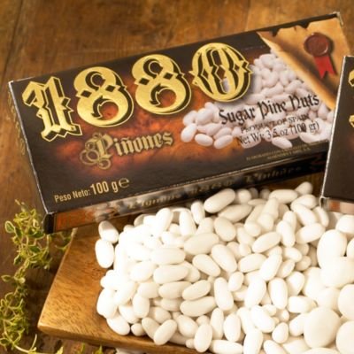 1880 Pinones – Candied Pine Nuts ( 3.5oz/100g) logo