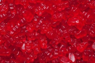 Albanese Confectionery 50111 case Gourmet Red Raspberry Gummi Bears, 20 Lb Case logo