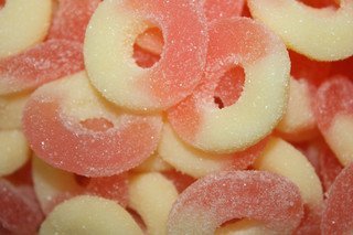 Albanese Confectionery 50130 case Strawberry Banana Gummi Rings, 18 Lb Case logo