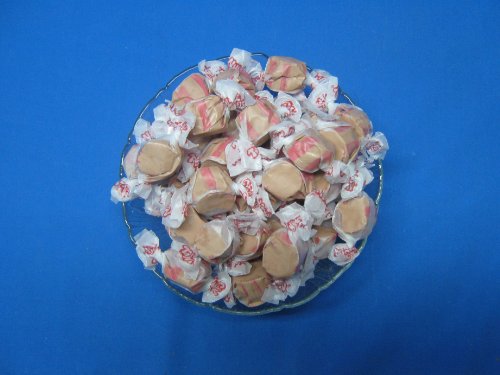 Cherry Cola Flavored Taffy Town Salt Water Taffy 2 Pound logo