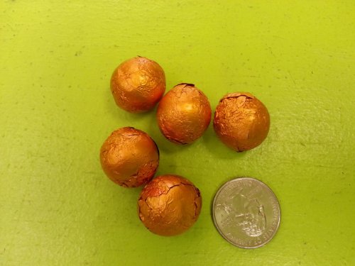 Chocolate Foil Marbles Balls Orange 1.5 Pound logo