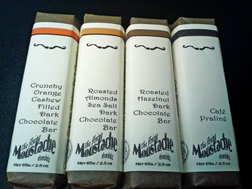 Dark Belgian Chocolate Bar Vegan Assortment: Almonds, Hazelnuts, Cashew, Orange, Coffee logo