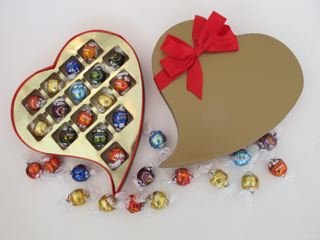 Easter, Mother’s Day, Birthday Gift. Chocolate Lindt Truffles,, Tear Drop Heart Gift Box Will Melt In Your Mouth Lindor Truffles logo