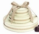 Holiday Three-tiered Chocolate Cirque Tower – Cream logo