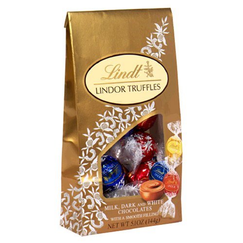 Lindt Lindor Truffles Assorted Milk, Dark & White Chocolate With Smooth Filling 5.1 Oz logo