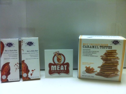 Meat Maniac Chocolate Bacon Triple Sampler Gift Pack With Sticker- Vosges Mo’s Uncured Bacon Caramel Toffee (4oz), Vosges Mo’s Mini Dark Choclate Bacon Bar (.5oz) & Vosges Mo’s Mini Milk Chocolate Bacon Bar (.5oz) logo