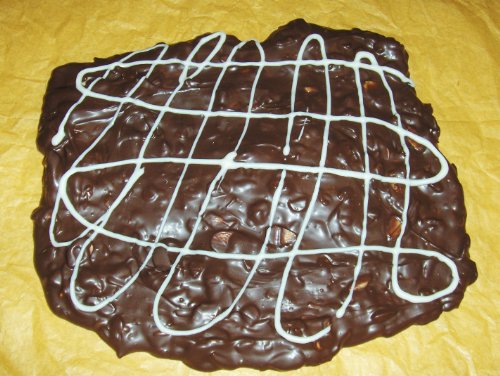 Peanut Butter Dark Chocolate Almond Bark, 16 Oz logo