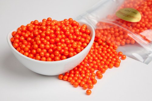 Pearl Orange Sugar Candy Beads (1 Pound Bag) logo