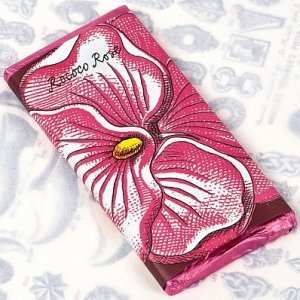 Rose Organic Dark Chocolate () By Nhr Organic Oils logo