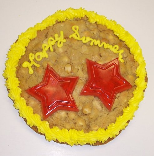 Scott’s Cakes 2 Lb. Chocolate Chip Cookie Cake With Watermelon Star Gummies logo