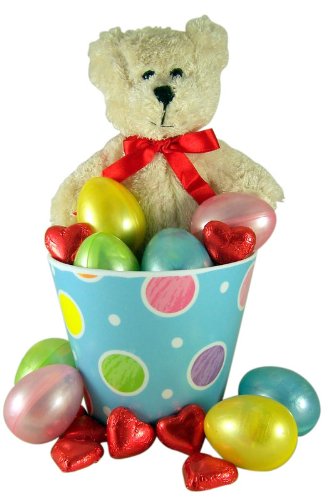 Teddy Bear Plush Toy In Easter Basket With Pastel Eggs and Chocolate Heart Candy logo