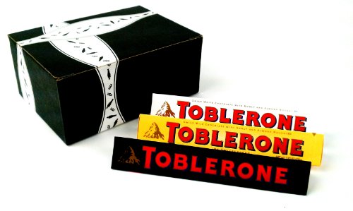 Toblerone 3-flavor Variety: One 3.52 Oz Bar Each Of Milk Chocolate, Dark Chocolate, and White Chocolate In A Gift Box logo