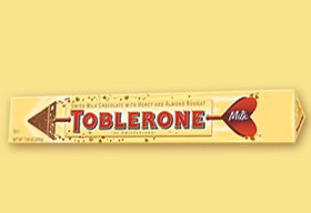Toblerone Swiss Milk Chocolate With Honey and Almond Nougat 7.05oz Velentine Bar logo