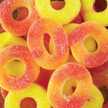 Trolli Gummi Peach Rings, 4lb Bag logo