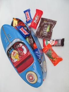 Valentines Day Gift Alternative Blue Race Car Metal Tin With Assorted Hershey Chocolates For The Race Car Enthusiast logo
