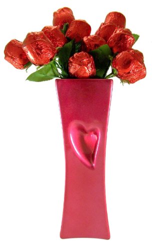Valentines Day Gift One Dozen Milk Chocolate Long Stem Roses In Metallic Pink Heart Vase logo
