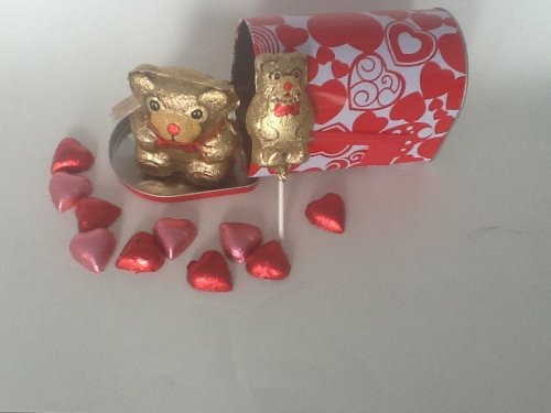 Valentine’s Day Gift White & Red Mailbox With A Special Delivery Of Irresistible Pink and Red Foiled Hearts Milk Chocolate With A Hollow Milk Chocolate Teddy Bear and Chocolate Pops logo