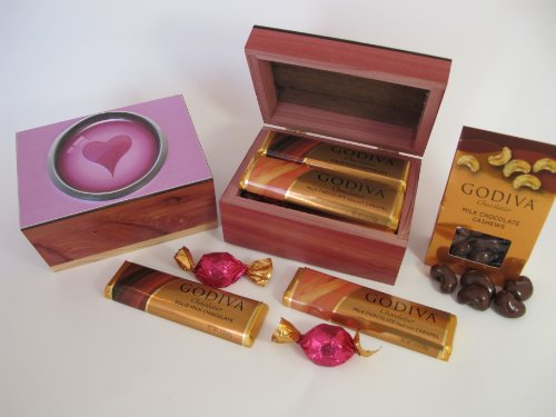 Valentine’s Heart, Godiva Cholcolate, Including 1.5 Oz Bar, 1.5 Oz Caramel Bar, 2 Oz Covered Cashews, & Truffle Gems logo